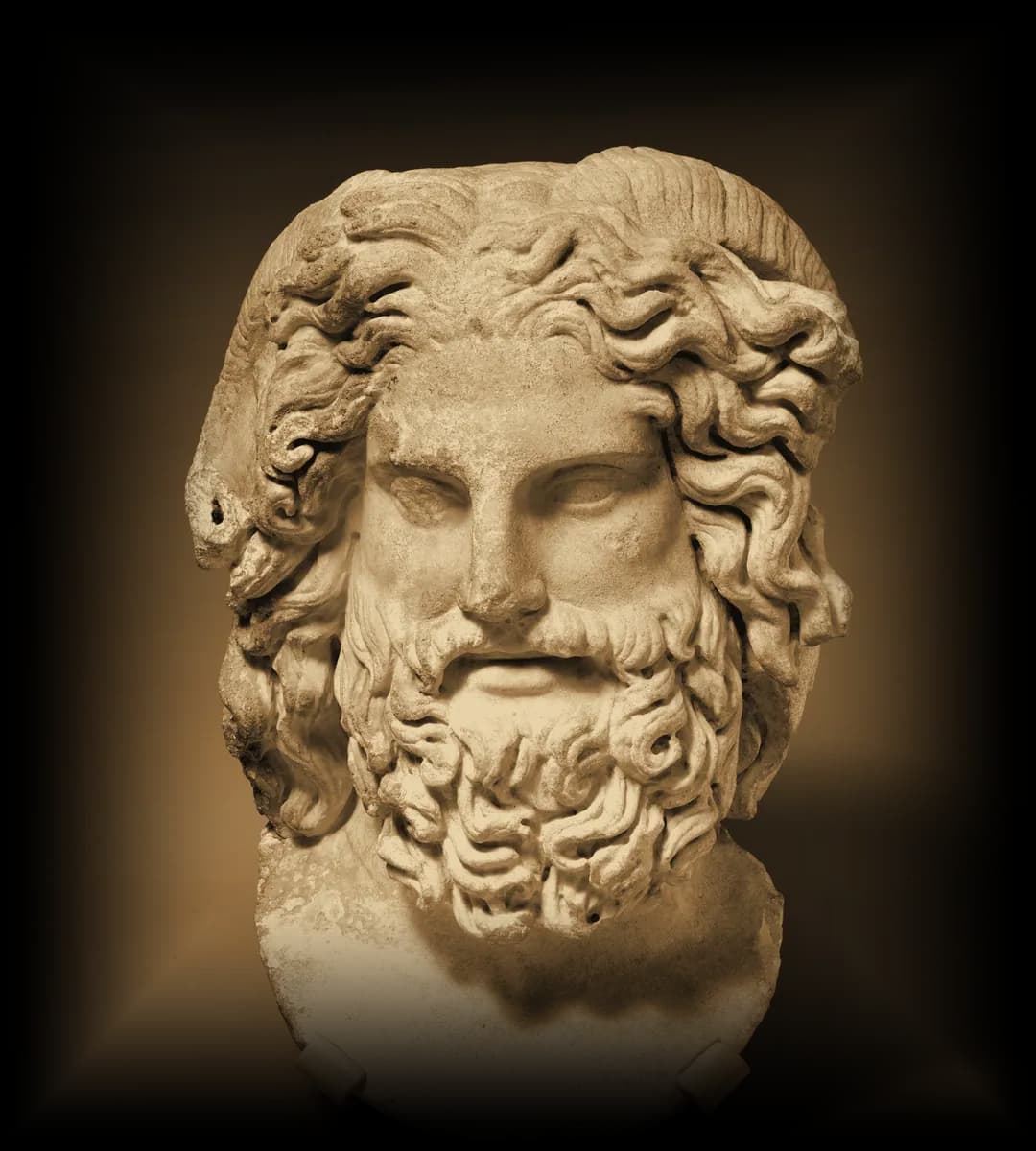 Cabeça de mármore de Zeus Ámon — o Conselho dos Moggers